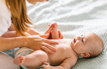 mom-doing-baby-massage-mobile