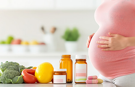 a pregnant woman with healthy vitamins